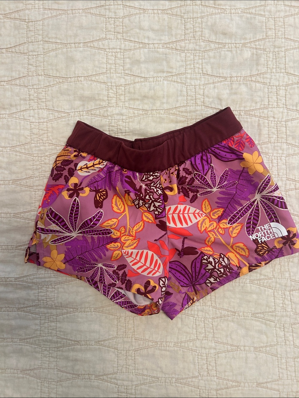 The North Face Girls' On Mountain Shorts in Sunset Mauve Lone Wanderer